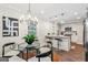 Charming dining area adjacent to the kitchen, with stylish lighting and cozy seating for a modern feel at 317 Mcpherson Se Pl, Atlanta, GA 30316