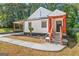 Charming craftsman home with inviting front porch and steps leading to the black front door at 317 Mcpherson Se Pl, Atlanta, GA 30316