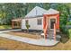 Charming craftsman home with inviting front porch and steps leading to the black front door at 317 Mcpherson Se Pl, Atlanta, GA 30316