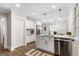Spacious eat-in kitchen features a center island, stainless appliances, and white cabinets at 317 Mcpherson Se Pl, Atlanta, GA 30316