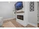 Close-up of a modern fireplace with stylish decor, a sleek design, and contemporary accents adding warmth to the living space at 11807 Alcovy Rd, Covington, GA 30014