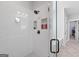 Beautiful walk-in shower with white subway tile and frameless glass enclosure at 11807 Alcovy Rd, Covington, GA 30014