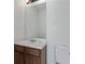 Bathroom featuring a vanity with a sink, mirror, lighting, and toilet at 11439 South Grove Dr, Hampton, GA 30228