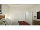 Cozy bedroom featuring a comfortable bed and an adjacent doorway leading to another room at 1217 Trombone Way # 6, Mcdonough, GA 30252