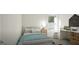 This is a bedroom, featuring modern furnishings, a desk and a large window at 1217 Trombone Way # 6, Mcdonough, GA 30252