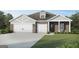 Charming brick home featuring a two-car garage and well-manicured lawn at 1217 Trombone Way # 6, Mcdonough, GA 30252