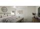 Comfortable main bedroom featuring a queen-sized bed and soft, natural light at 1217 Trombone Way # 6, Mcdonough, GA 30252