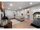 Spacious living room with wood floors, comfortable seating, and a cozy ambiance at 1412 Short Ct, Mcdonough, GA 30252