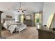 Spacious main bedroom with neutral decor, large windows, vaulted ceiling, and ample natural light at 1412 Short Ct, Mcdonough, GA 30252