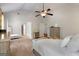 Bright and airy main bedroom featuring a vaulted ceiling, carpeted floors, and tasteful furnishings at 1412 Short Ct, Mcdonough, GA 30252