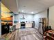 Basement kitchen with stainless steel appliances, bright recessed lighting, and sleek cabinetry at 1690 Geranium Ln, Cumming, GA 30040