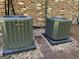 The exterior of the home has air conditioning units at 245 River Laurel Way, Woodstock, GA 30188