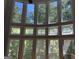 Living room windows showing decorative glass at the mid point and lovely views outside at 245 River Laurel Way, Woodstock, GA 30188