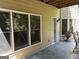 Outdoor living space featuring large windows, door, and a seating area at 245 River Laurel Way, Woodstock, GA 30188