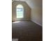 Cozy room with a vaulted ceiling, large window for natural light at 436 Abbey Pl, Villa Rica, GA 30180
