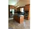 Well-equipped kitchen featuring stainless steel appliances, granite countertops, and a center island at 436 Abbey Pl, Villa Rica, GA 30180