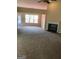 Inviting living room features a fireplace and large windows allowing natural light at 436 Abbey Pl, Villa Rica, GA 30180