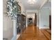 Elegant foyer with hardwood floors and a view into the living room at 692 Brooks Woolsey Rd, Brooks, GA 30205