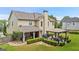 Secluded backyard with a covered patio, gazebo, and mature landscaping at 960 Pebblestone Ct, Alpharetta, GA 30009