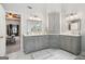 Bathroom with and sinks, quartz countertops, and a glass enclosed shower at 960 Pebblestone Ct, Alpharetta, GA 30009