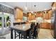 Beautiful kitchen featuring custom cabinetry, stainless appliances, and center island at 960 Pebblestone Ct, Alpharetta, GA 30009