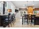 This kitchen boasts counter seating, granite countertops, a suite of stainless steel appliances, and access to the backyard at 960 Pebblestone Ct, Alpharetta, GA 30009
