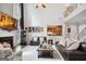 Bright, open living room features a fireplace, high ceilings, and stylish furnishings at 960 Pebblestone Ct, Alpharetta, GA 30009