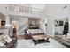 Spacious living room with a loft and hardwood flooring, perfect for entertaining guests at 960 Pebblestone Ct, Alpharetta, GA 30009