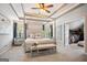Spacious main bedroom features a four-poster bed, soft lighting, and a walk-in closet at 960 Pebblestone Ct, Alpharetta, GA 30009