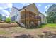 Spacious backyard featuring a charming deck overlooking the landscape at 375 Foster Dr, Mcdonough, GA 30253