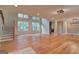 Bright living room featuring hardwood floors, recessed lighting, and tall windows at 375 Foster Dr, Mcdonough, GA 30253