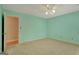 Light-filled bedroom featuring plush carpet, a ceiling fan, and freshly painted walls, offering a cozy retreat at 157 Rockspray Rdg, Peachtree City, GA 30269
