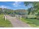 Picturesque bridge over a tranquil lake with lush green surroundings at 157 Rockspray Rdg, Peachtree City, GA 30269