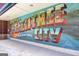 Colorful community mural depicting 