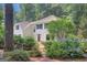 Beautiful two-story home with a lush front yard featuring colorful hydrangeas at 157 Rockspray Rdg, Peachtree City, GA 30269