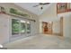 Bright living room with access to an outdoor patio, open floor plan and natural light at 157 Rockspray Rdg, Peachtree City, GA 30269