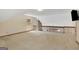Spacious carpeted loft area with natural light and an overlooking view of the living room at 157 Rockspray Rdg, Peachtree City, GA 30269
