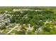 Aerial view of a neighborhood surrounded by lush trees at 7455 Dover Ct, Riverdale, GA 30274