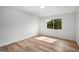 Well lit bedroom with large window offering plenty of natural light at 7455 Dover Ct, Riverdale, GA 30274