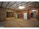 Large unfinished basement space offering potential for customization with exposed framing and concrete floor at 1315 Crane Ct, Mcdonough, GA 30252
