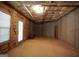 Unfinished basement featuring insulated walls, a door to the outside, and window, ready to be customized at 1315 Crane Ct, Mcdonough, GA 30252