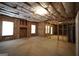 Spacious unfinished basement with exposed wood framing, concrete flooring, and natural light at 1315 Crane Ct, Mcdonough, GA 30252