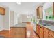 Open kitchen with granite counters, an island, and seamless flow to the living area at 1315 Crane Ct, Mcdonough, GA 30252