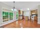Bright eat-in kitchen featuring wood cabinets, granite counters, and stainless appliances at 1315 Crane Ct, Mcdonough, GA 30252