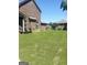 Expansive backyard with lush green grass, perfect for outdoor activities and relaxation at 1869 Schofield Dr, Hampton, GA 30228