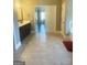 Spacious bathroom with a dark wood vanity and access to the living room and closet at 1869 Schofield Dr, Hampton, GA 30228