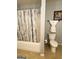 View of a clean, well-maintained bathroom with a shower and toilet at 1869 Schofield Dr, Hampton, GA 30228