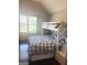 Cozy bedroom with a bunk bed, natural light, and a window view at 1869 Schofield Dr, Hampton, GA 30228