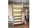 Well-organized closet features built in shelving at 1869 Schofield Dr, Hampton, GA 30228