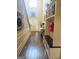 Spacious foyer with a storage bench and stylish decor leading to the front door at 1869 Schofield Dr, Hampton, GA 30228